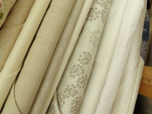 Against white/beige fabric