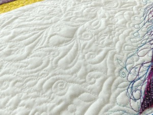 The back ground was covered withe doodle quilting.